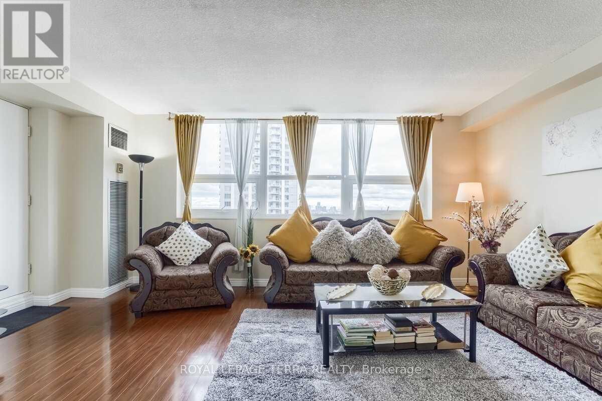 1207 - 4 Lisa Street, Brampton, ON - Indoor Photo Showing Living Room