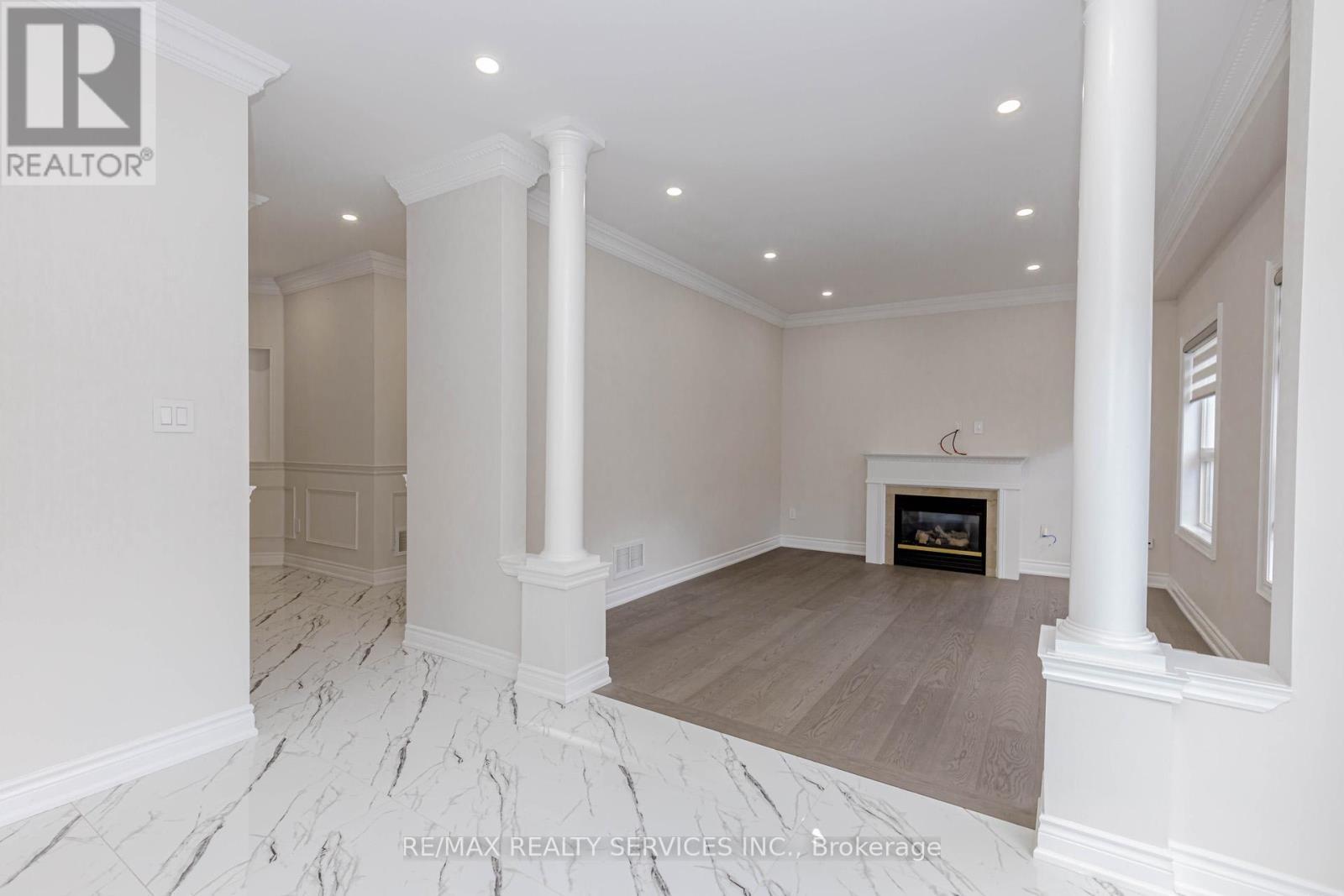 Upper - 50 Amboise Crescent, Brampton, ON - Indoor With Fireplace