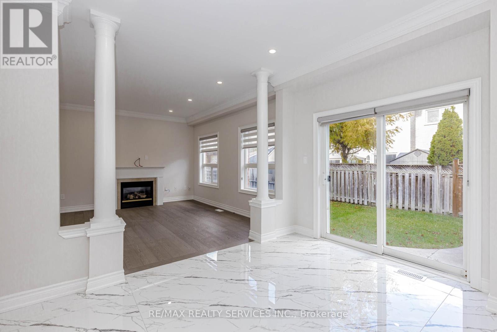 Upper - 50 Amboise Crescent, Brampton, ON - Indoor With Fireplace