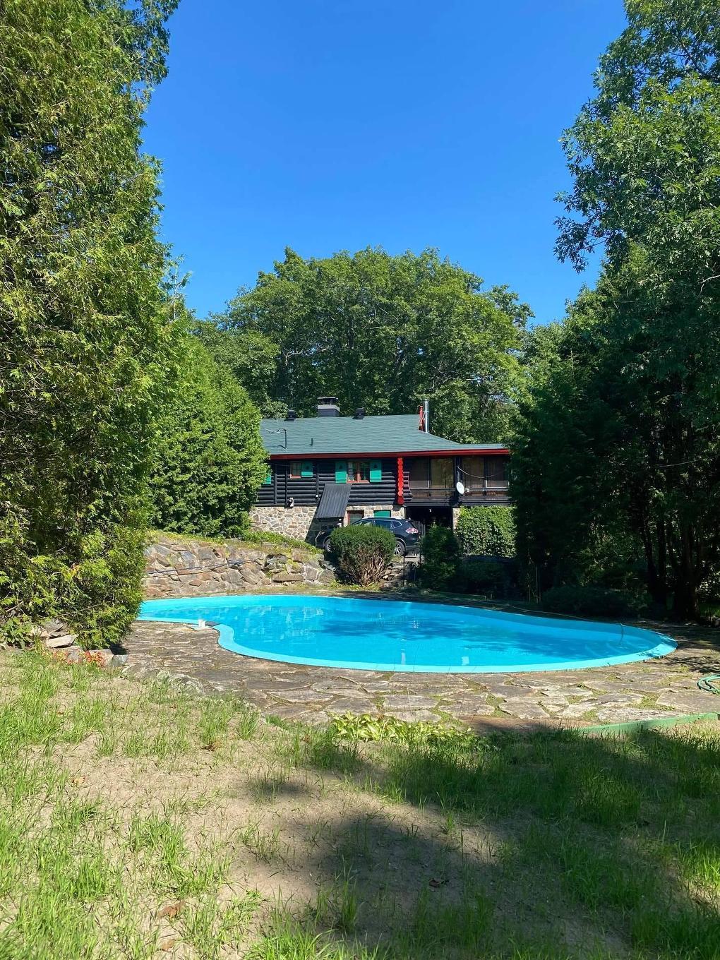 Exterior - 477 Ch. Des Critiques, Montebello, QC - Outdoor With In Ground Pool