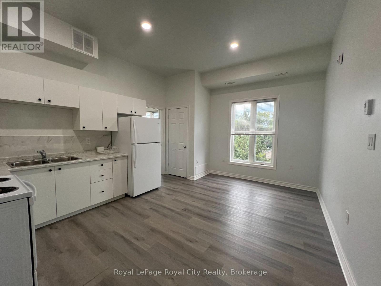 304 - 71 Victoria Street, Centre Wellington (Elora/Salem), ON - Indoor Photo Showing Kitchen With Double Sink
