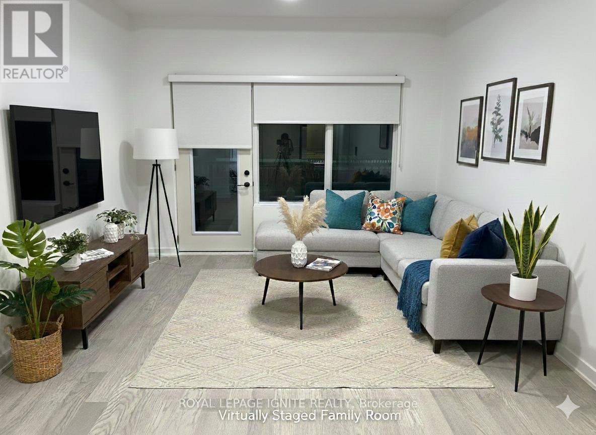 207 - 123 Maurice Drive, Oakville, ON - Indoor Photo Showing Living Room