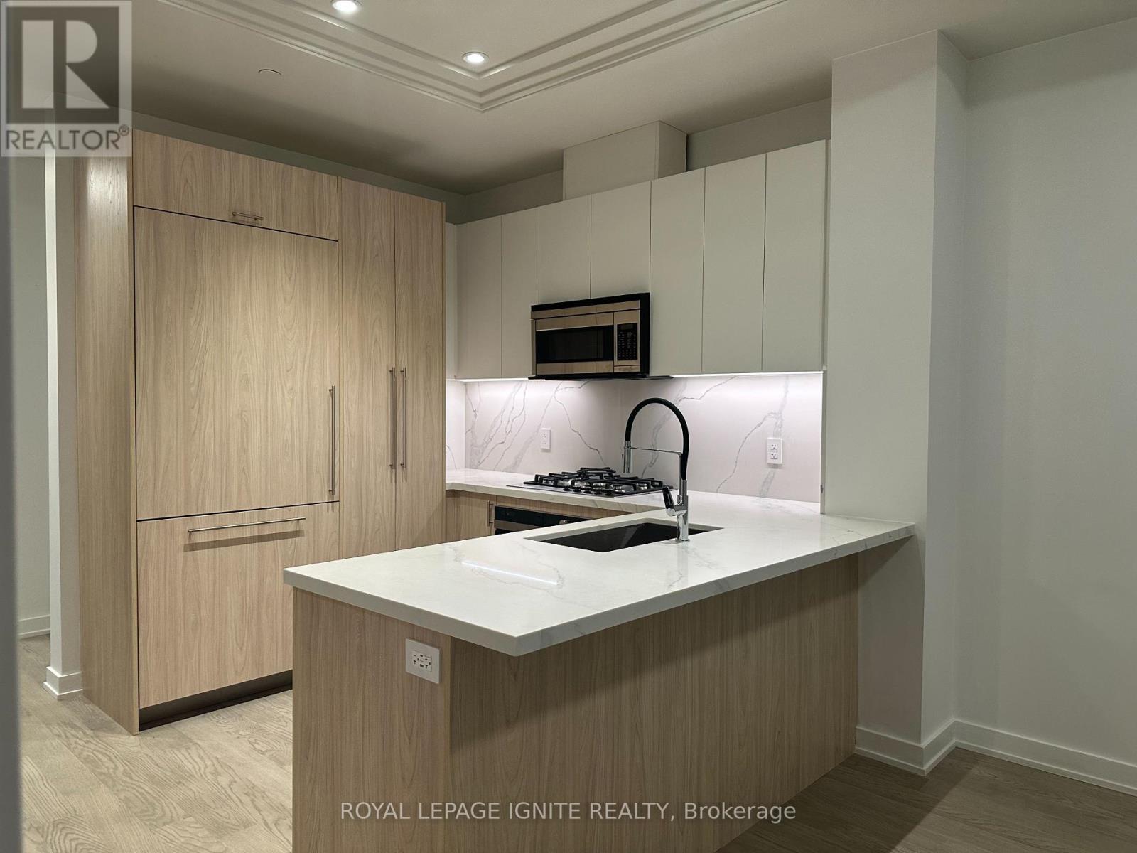 207 - 123 Maurice Drive, Oakville, ON - Indoor Photo Showing Kitchen