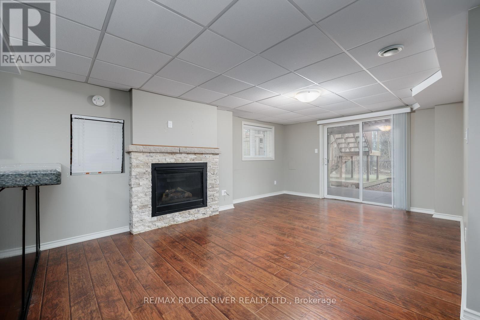 34 Harry Gay Drive, Clarington (Courtice), ON - Indoor Photo Showing Other Room With Fireplace