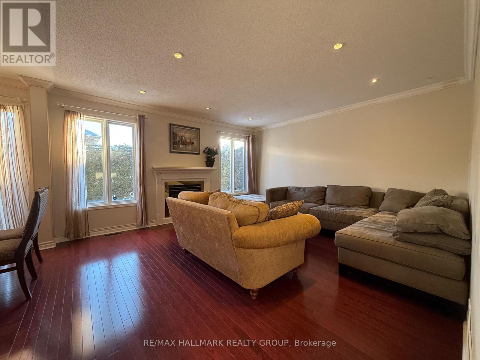 2 Kentsdale Drive, Ottawa, ON - Indoor Photo Showing Living Room With Fireplace