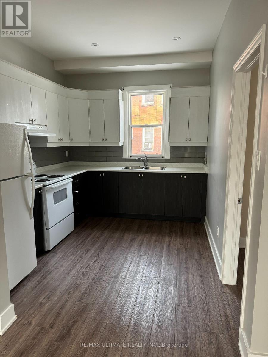 Main - 75 Rosemount Avenue, Toronto, ON - Indoor Photo Showing Kitchen With Double Sink