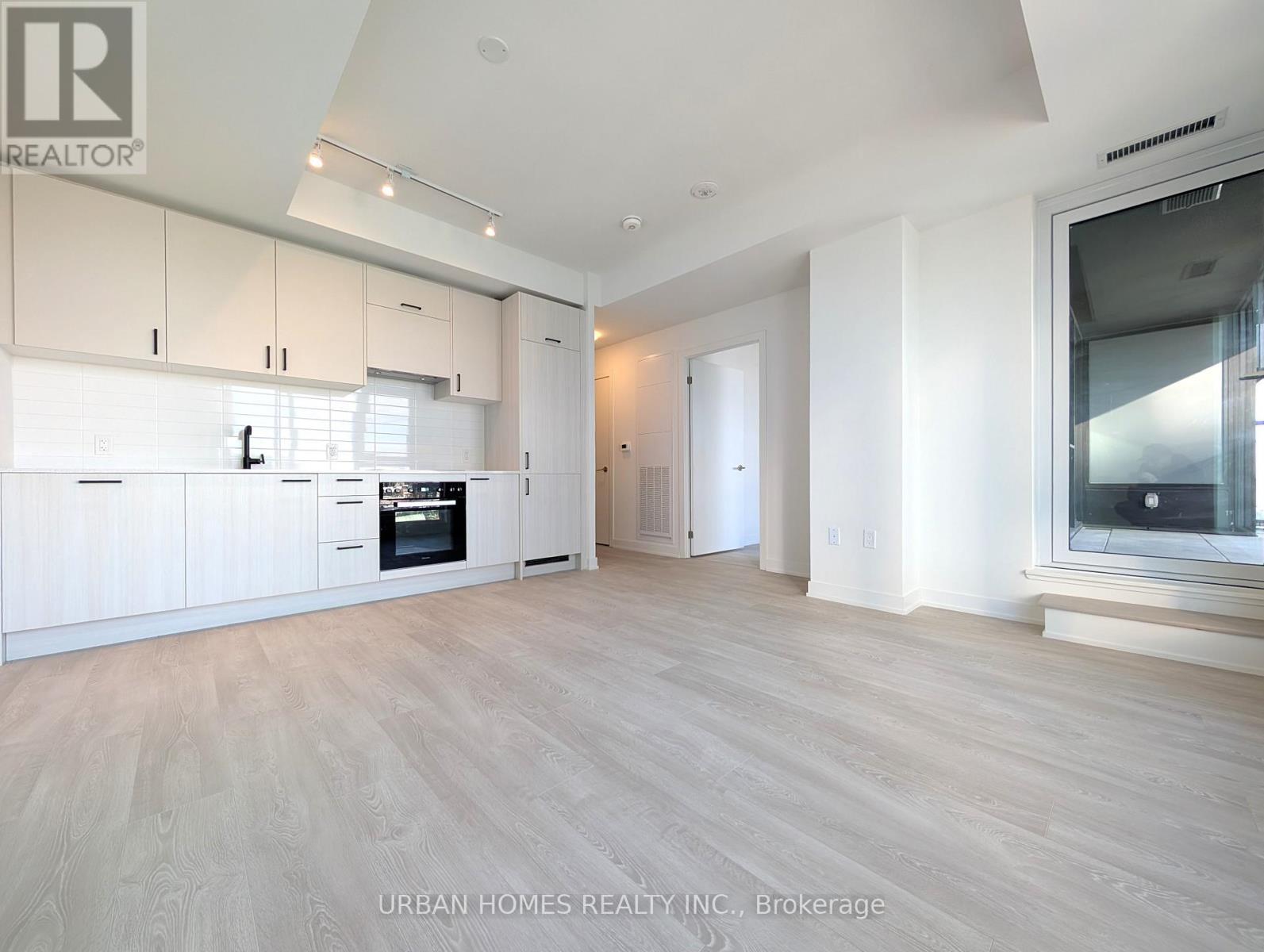 1120 - 1 Quarrington Lane, Toronto, ON - Indoor Photo Showing Kitchen
