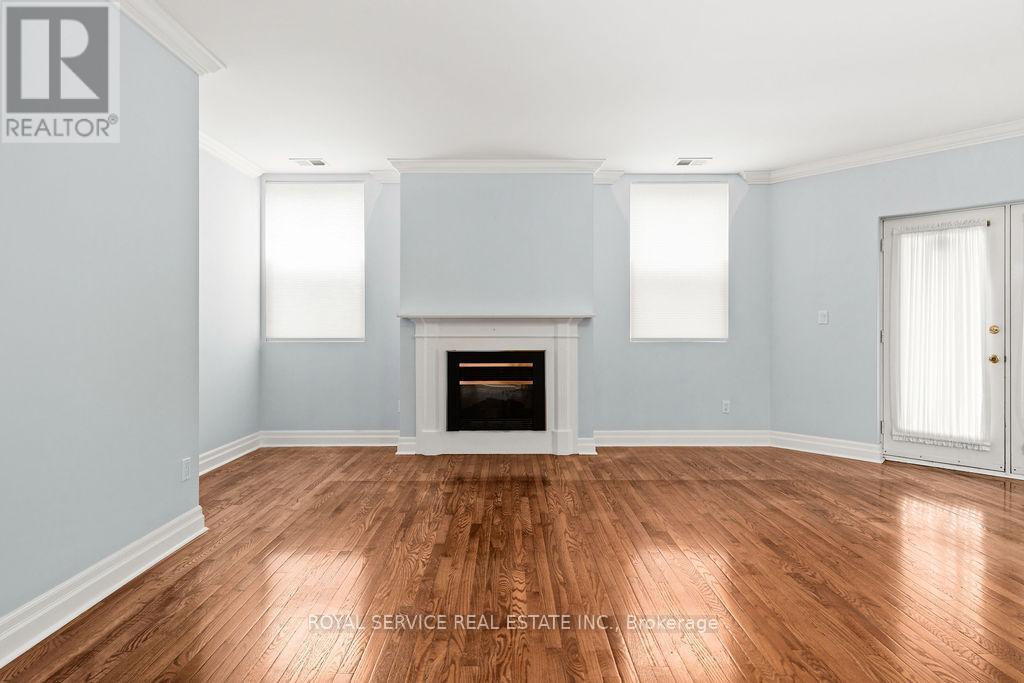1 - 220 Church Street, Cobourg, ON - Indoor Photo Showing Living Room With Fireplace