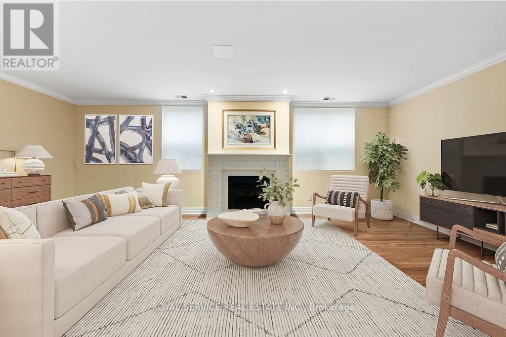 Virtually staged - 1 - 220 Church Street, Cobourg, ON - Indoor Photo Showing Living Room With Fireplace