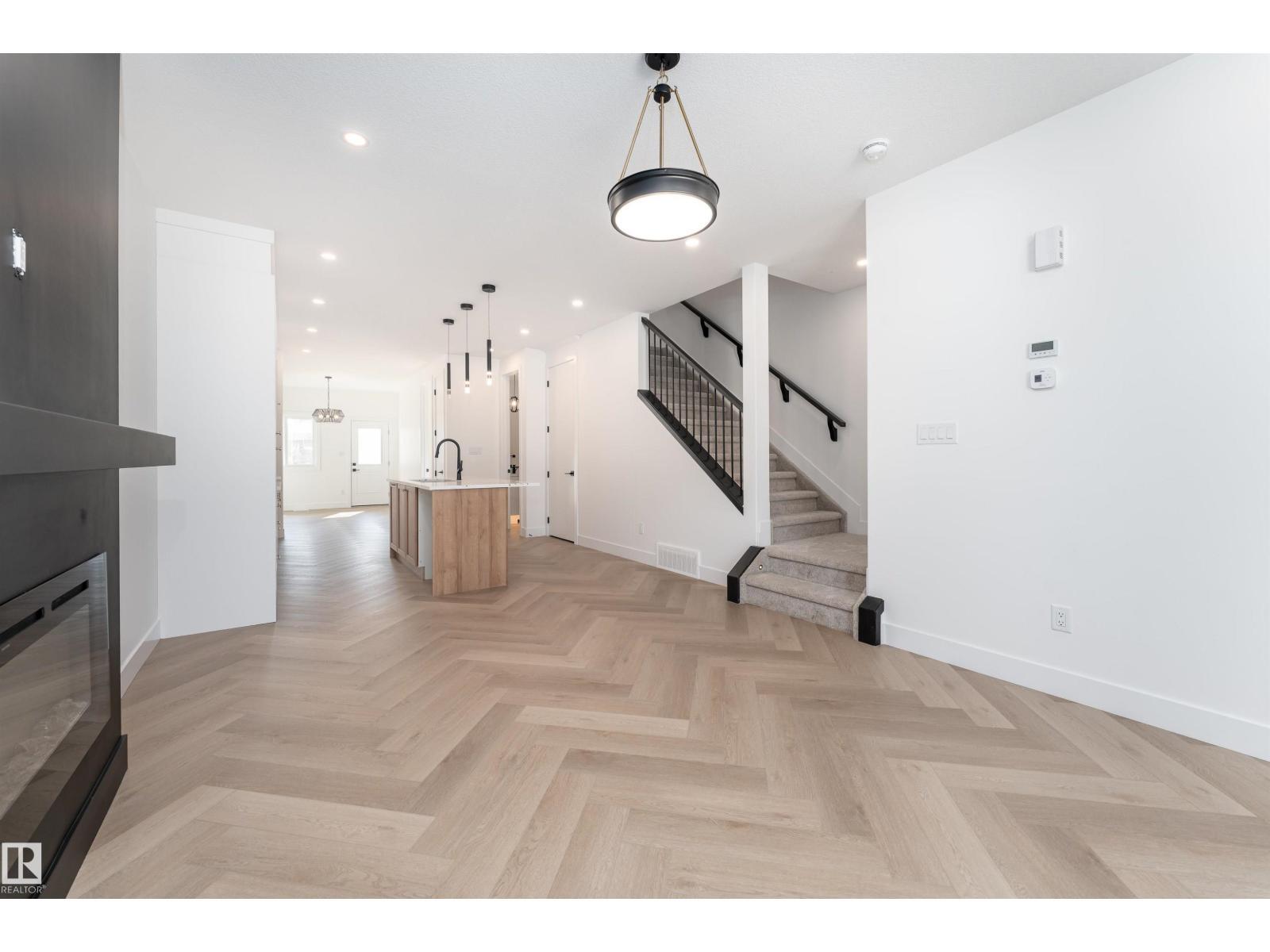 3127 Magpie Wy Nw, Edmonton, AB - Indoor With Fireplace