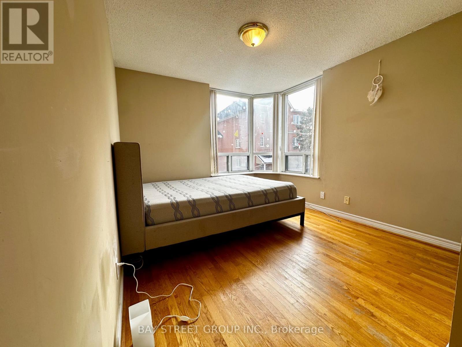 203 - 1883 Mcnicoll Avenue, Toronto, ON - Indoor Photo Showing Bedroom