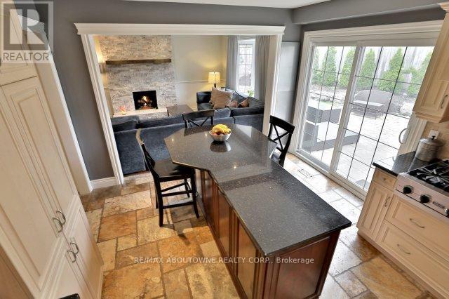 263 Princess Royal Court, Oakville, ON - Indoor Photo Showing Dining Room With Fireplace