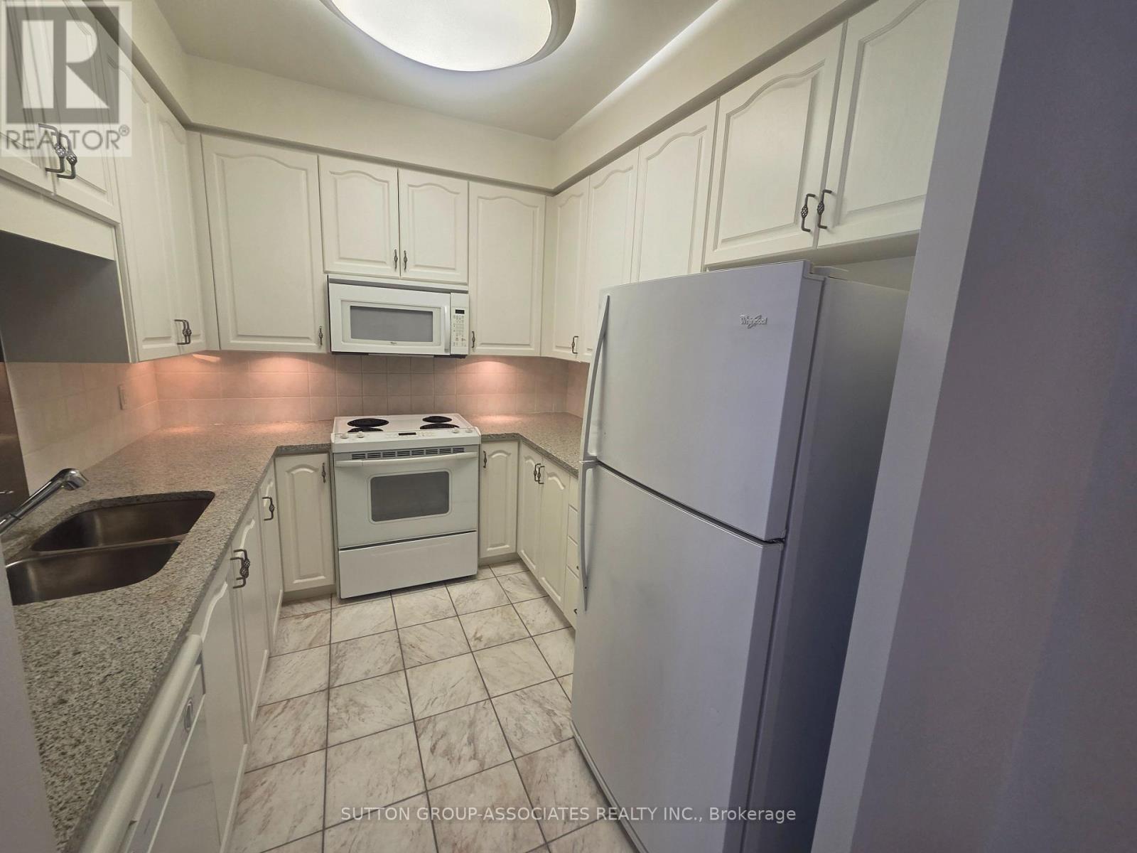 207 - 11 William Carson Crescent, Toronto, ON - Indoor Photo Showing Kitchen With Double Sink