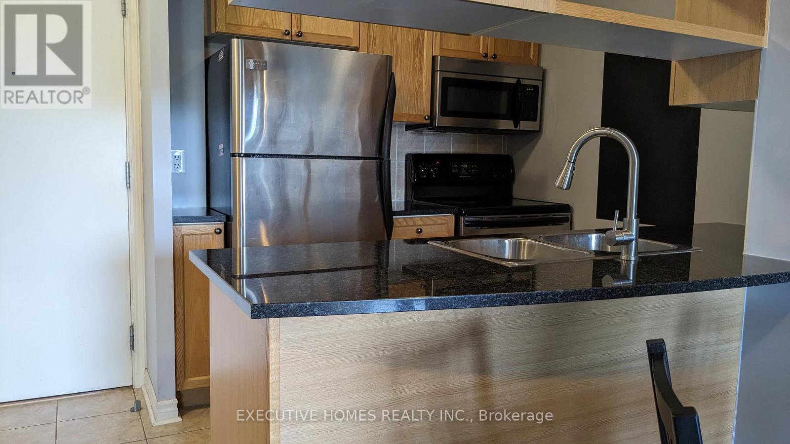 307 - 2379 Central Park Drive, Oakville, ON - Indoor Photo Showing Kitchen With Stainless Steel Kitchen With Double Sink
