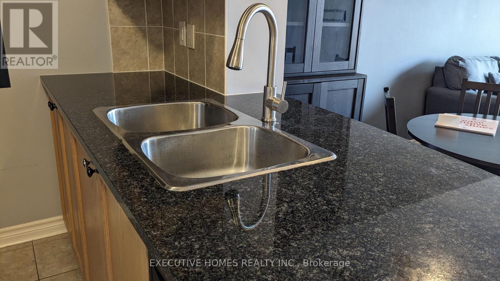 307 - 2379 Central Park Drive, Oakville, ON - Indoor Photo Showing Kitchen With Double Sink