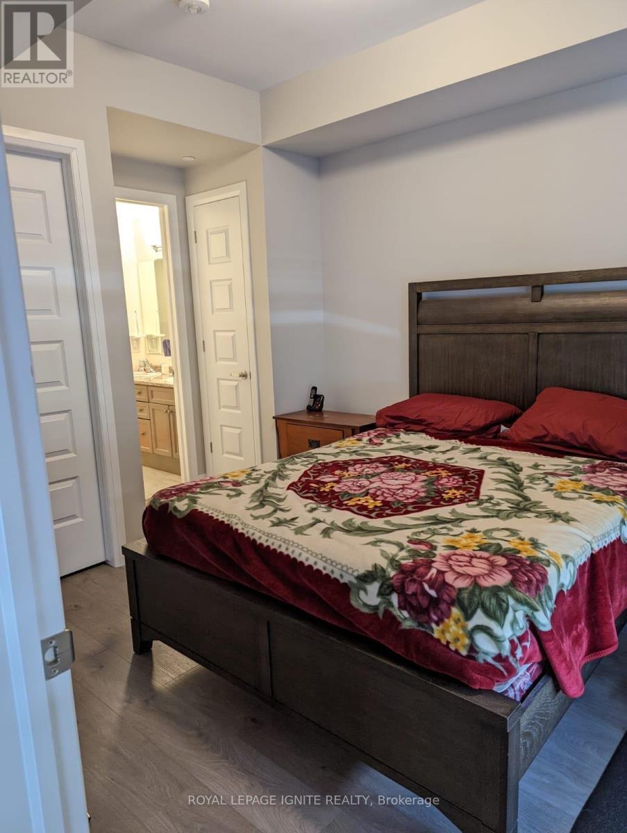 314 - 2 Adam Sellers Street, Markham, ON - Indoor Photo Showing Bedroom