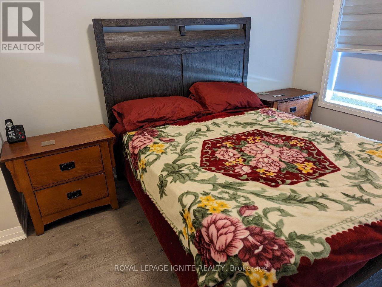 314 - 2 Adam Sellers Street, Markham, ON - Indoor Photo Showing Bedroom