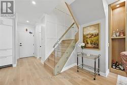 Staircase with Glass Panels and Artistic Accents -