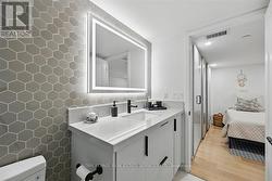 Spa-Inspired Bath Features an Upgraded Backsplash -