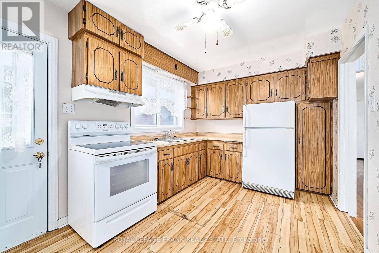 28 Winnipeg Road, Toronto (Kingsview Village-The Westway), ON - Indoor Photo Showing Kitchen With Double Sink