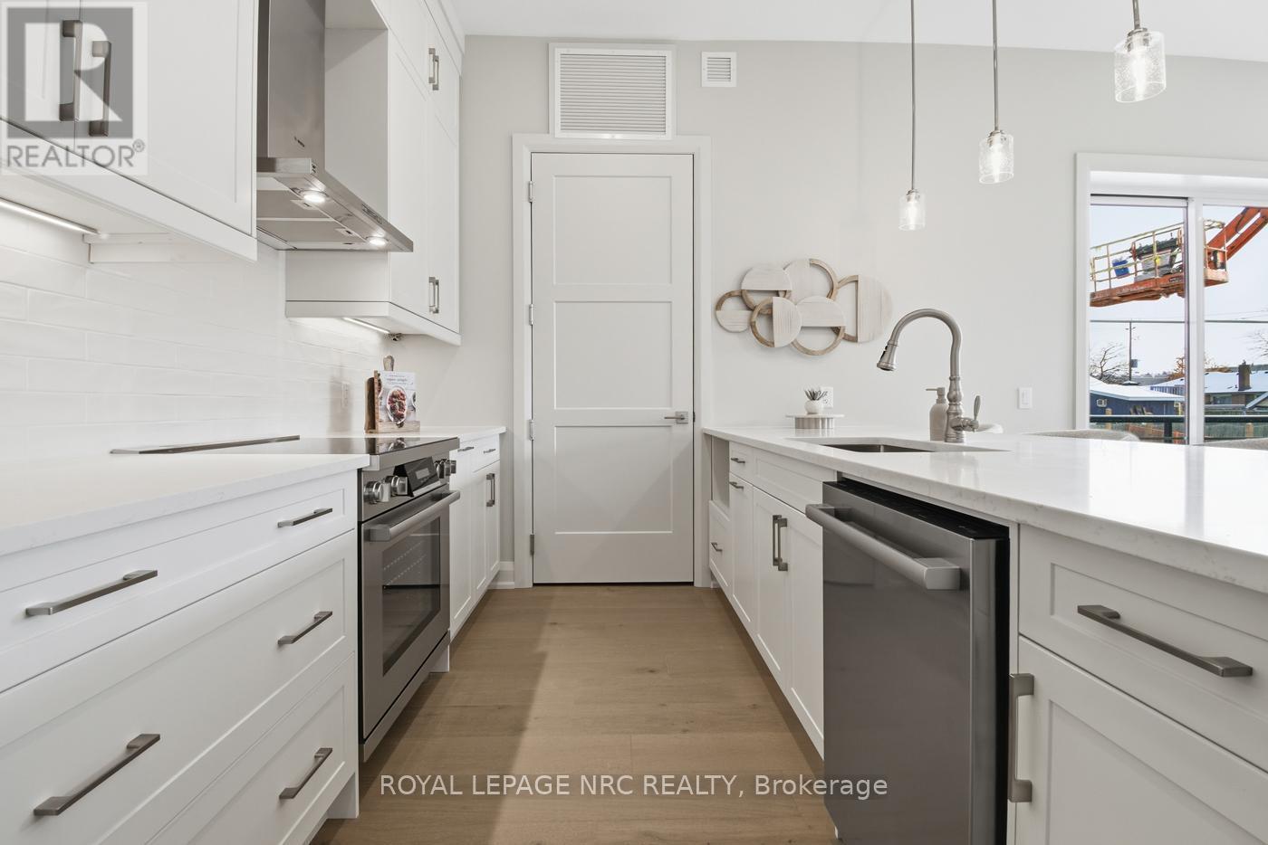 Model Suite 101 - 204 - 2 Arbourvale Common, St. Catharines (Glendale/Glenridge), ON - Indoor Photo Showing Kitchen With Upgraded Kitchen