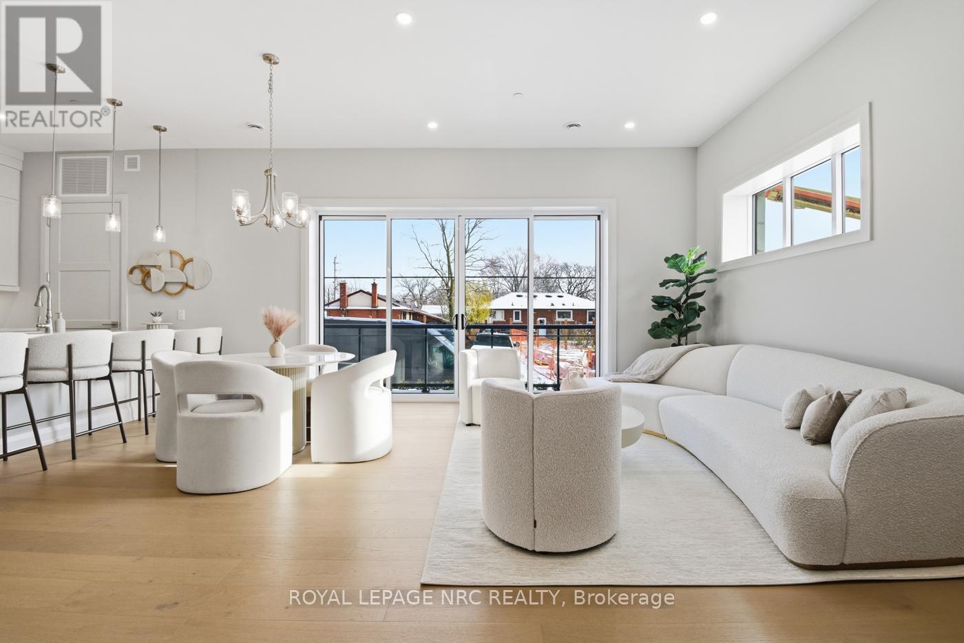 Model Suite 101 - 204 - 2 Arbourvale Common, St. Catharines (Glendale/Glenridge), ON - Indoor Photo Showing Living Room