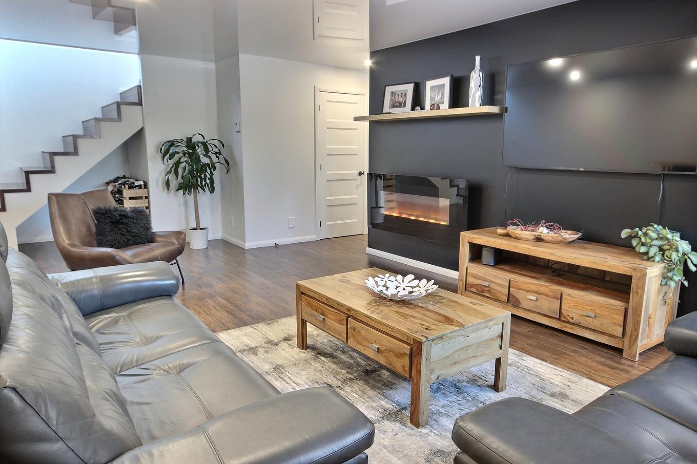 Salle familiale - 771 Av. Terry-Fox, Rouyn-Noranda, QC - Indoor Photo Showing Living Room With Fireplace