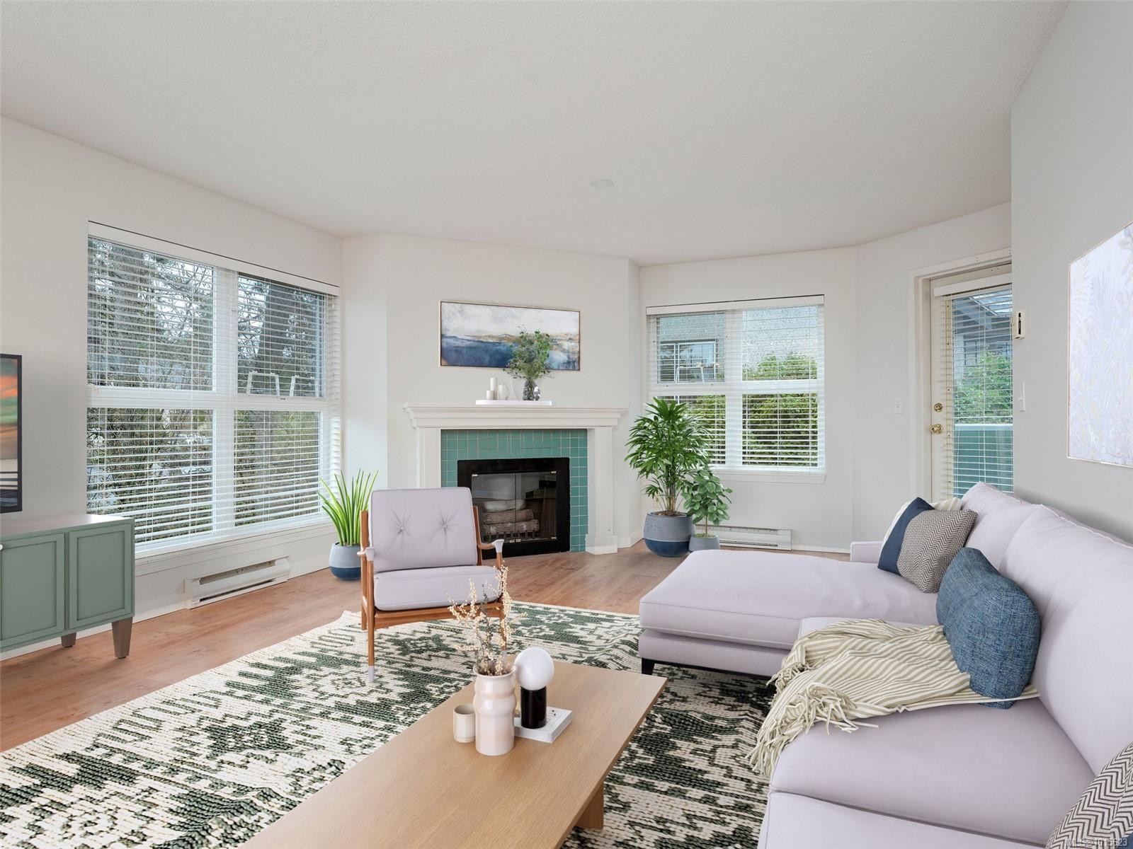 302-1201 Hillside Ave, Victoria, BC - Indoor Photo Showing Living Room With Fireplace