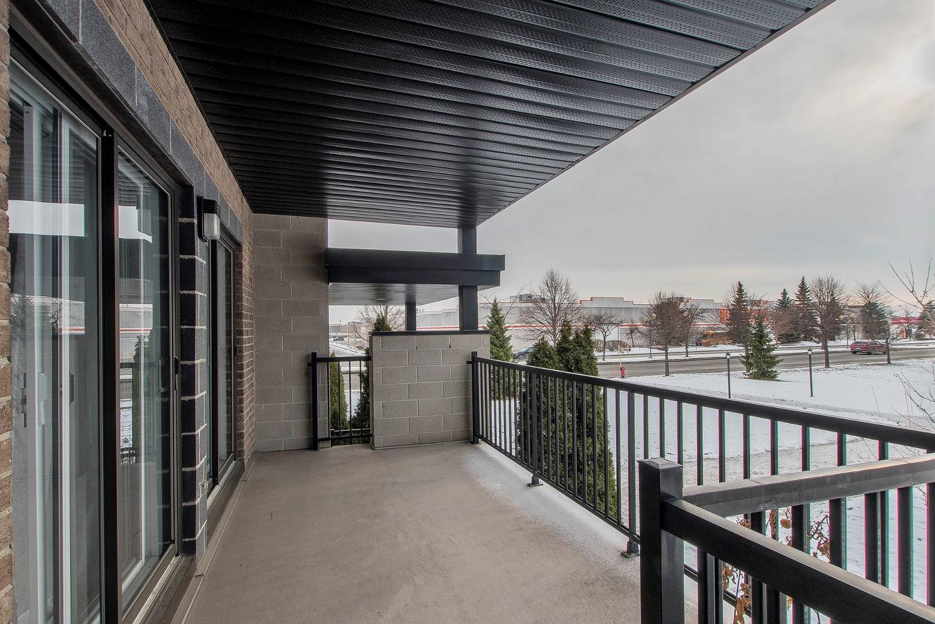 Patio - 201-691 Mtée Des Pionniers, Terrebonne (Lachenaie), QC - Outdoor With Exterior