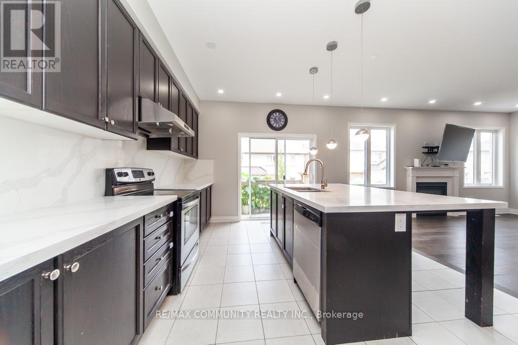 24 Raithby Crescent, Ajax, ON - Indoor Photo Showing Kitchen With Upgraded Kitchen