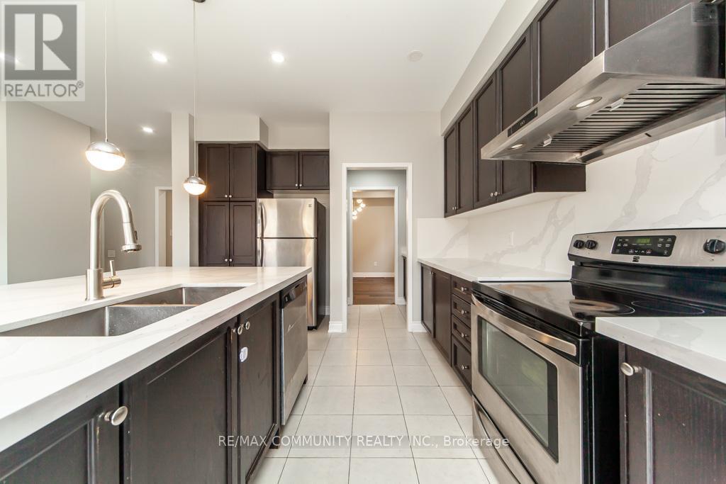 24 Raithby Crescent, Ajax, ON - Indoor Photo Showing Kitchen With Stainless Steel Kitchen With Double Sink With Upgraded Kitchen
