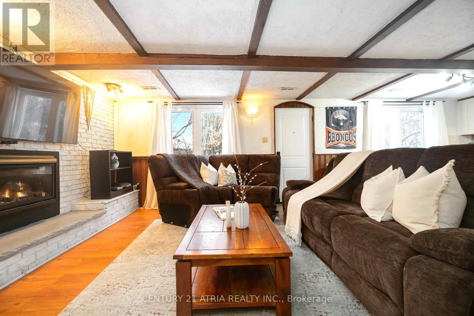 39 Amberdale Drive, Toronto, ON - Indoor Photo Showing Living Room With Fireplace