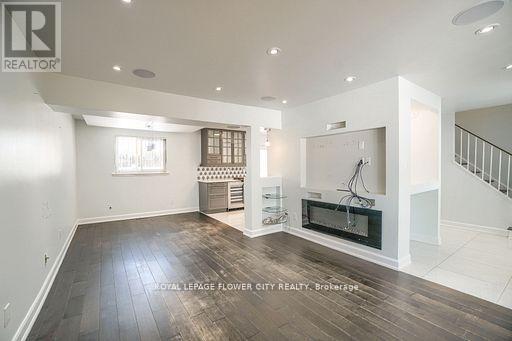 Main Floor - 12 Gondola Crescent, Brampton, ON - Indoor With Fireplace