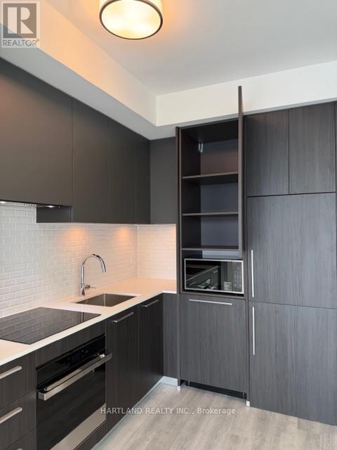 Kitchen w/storage - 1110 - 65 Broadway Avenue, Toronto, ON - Indoor Photo Showing Kitchen With Upgraded Kitchen
