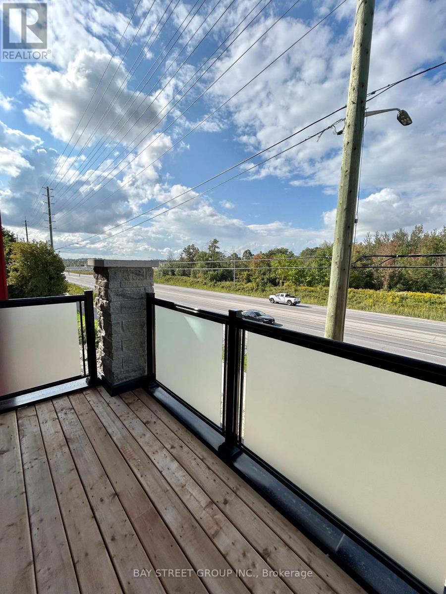 Balcony Through Kitchen - 614 - 1034 Reflection Place, Pickering, ON - Outdoor With Balcony With View