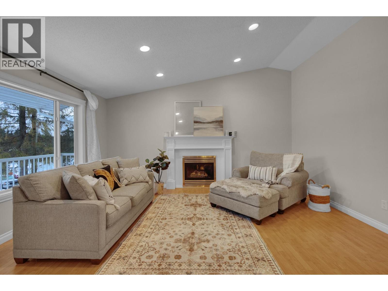 7941 Rosewood Place, Prince George, BC - Indoor Photo Showing Living Room With Fireplace