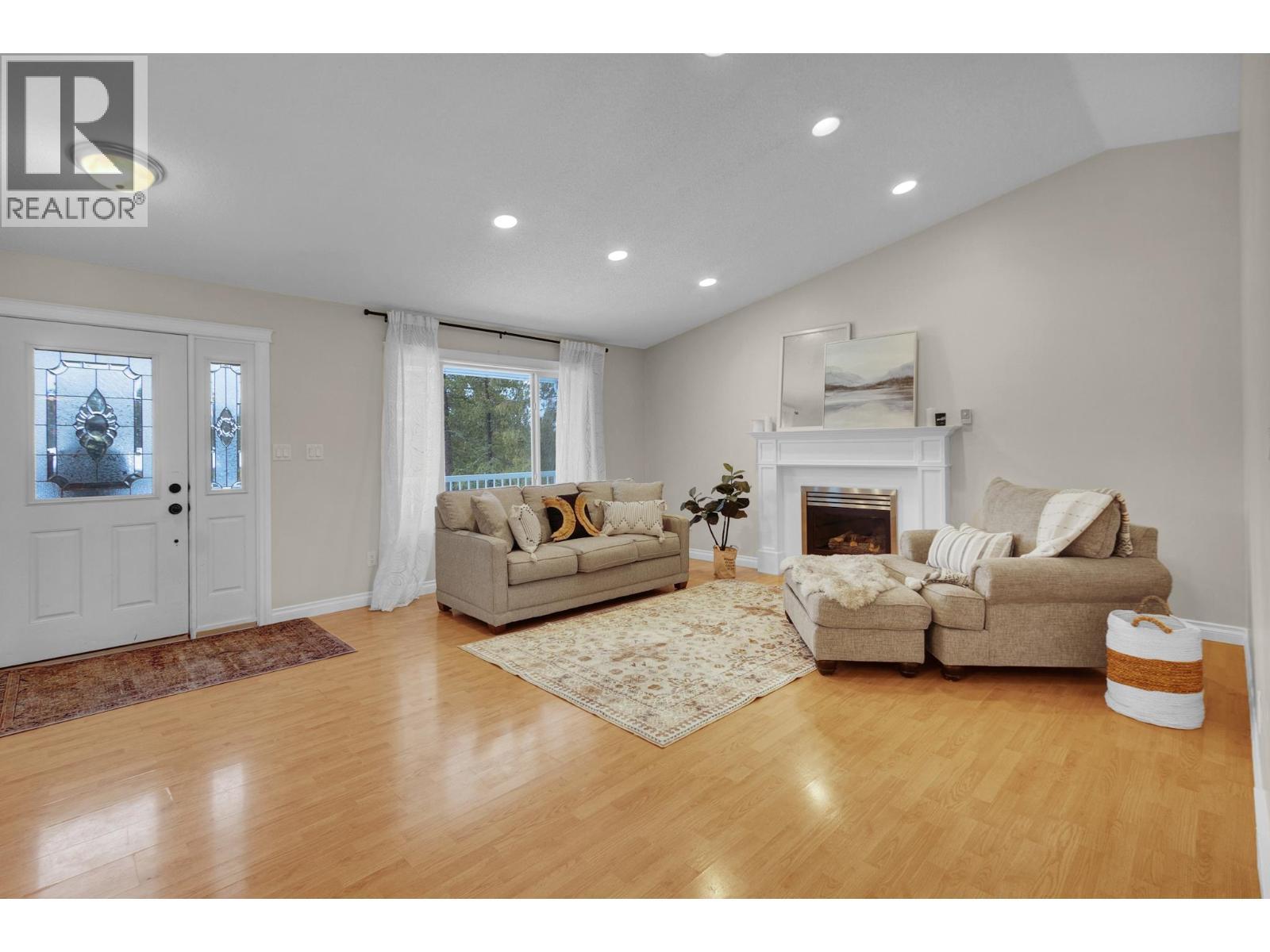 7941 Rosewood Place, Prince George, BC - Indoor Photo Showing Living Room With Fireplace