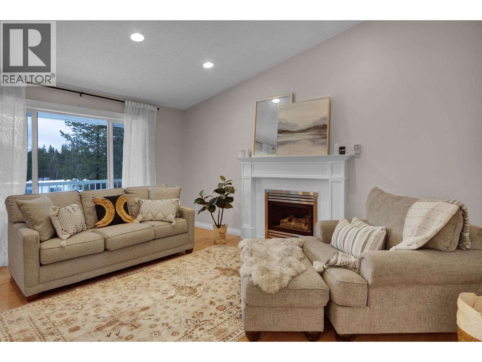 7941 Rosewood Place, Prince George, BC - Indoor Photo Showing Living Room With Fireplace
