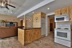 Kitchen with fridge, stove & micro, no dishwasher -