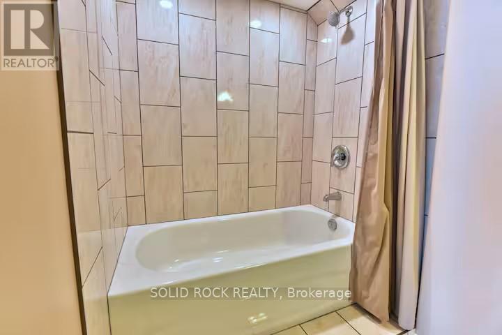 Tile tub surround - 5 Shoreline Road, Edwardsburgh/Cardinal, ON - Indoor Photo Showing Bathroom