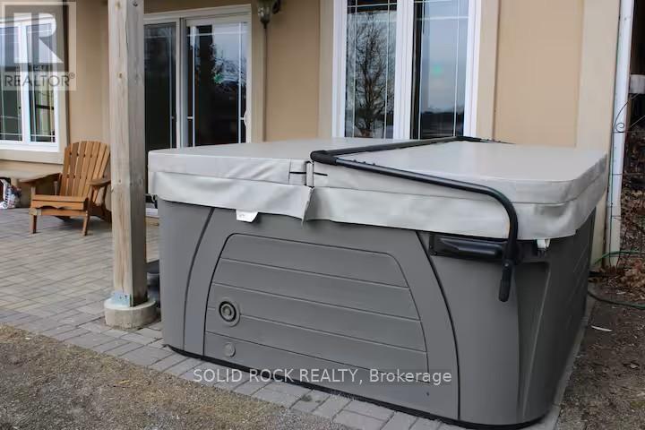 Close up of hot tub - 5 Shoreline Road, Edwardsburgh/Cardinal, ON - Outdoor With Exterior
