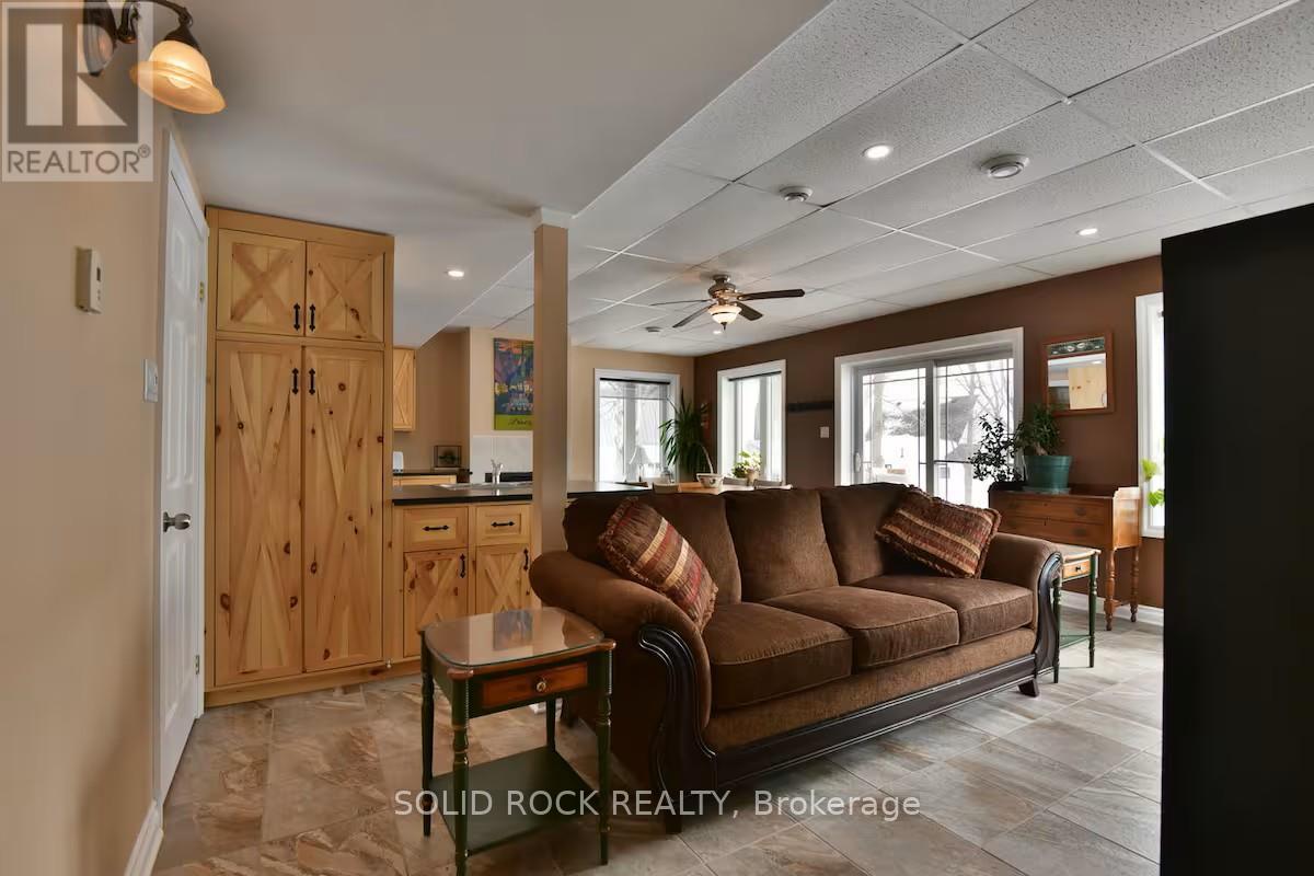 and patio door leading to hot tub - 5 Shoreline Road, Edwardsburgh/Cardinal, ON - Indoor