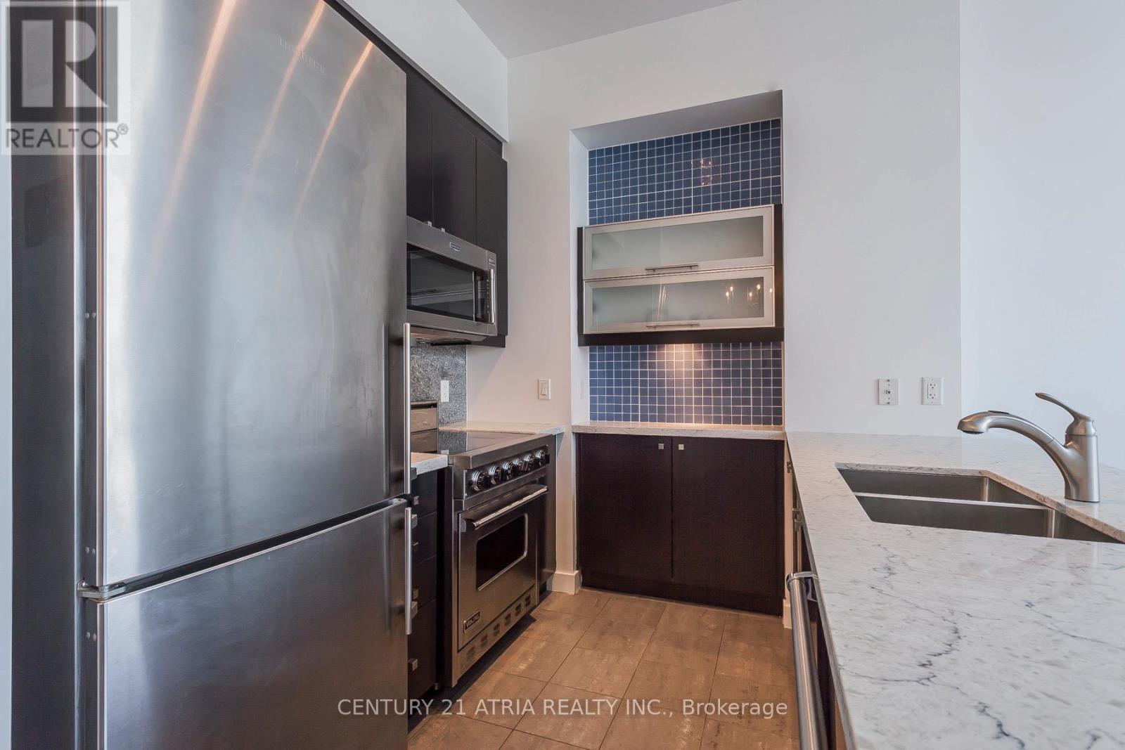 Ph03 - 11 Brunel Court, Toronto, ON - Indoor Photo Showing Kitchen With Double Sink