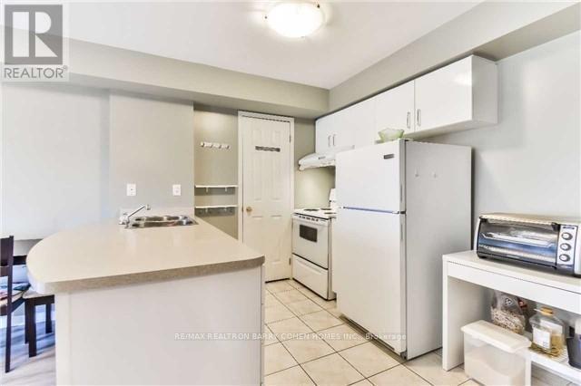 205 - 308 John Street, Markham, ON - Indoor Photo Showing Kitchen With Double Sink