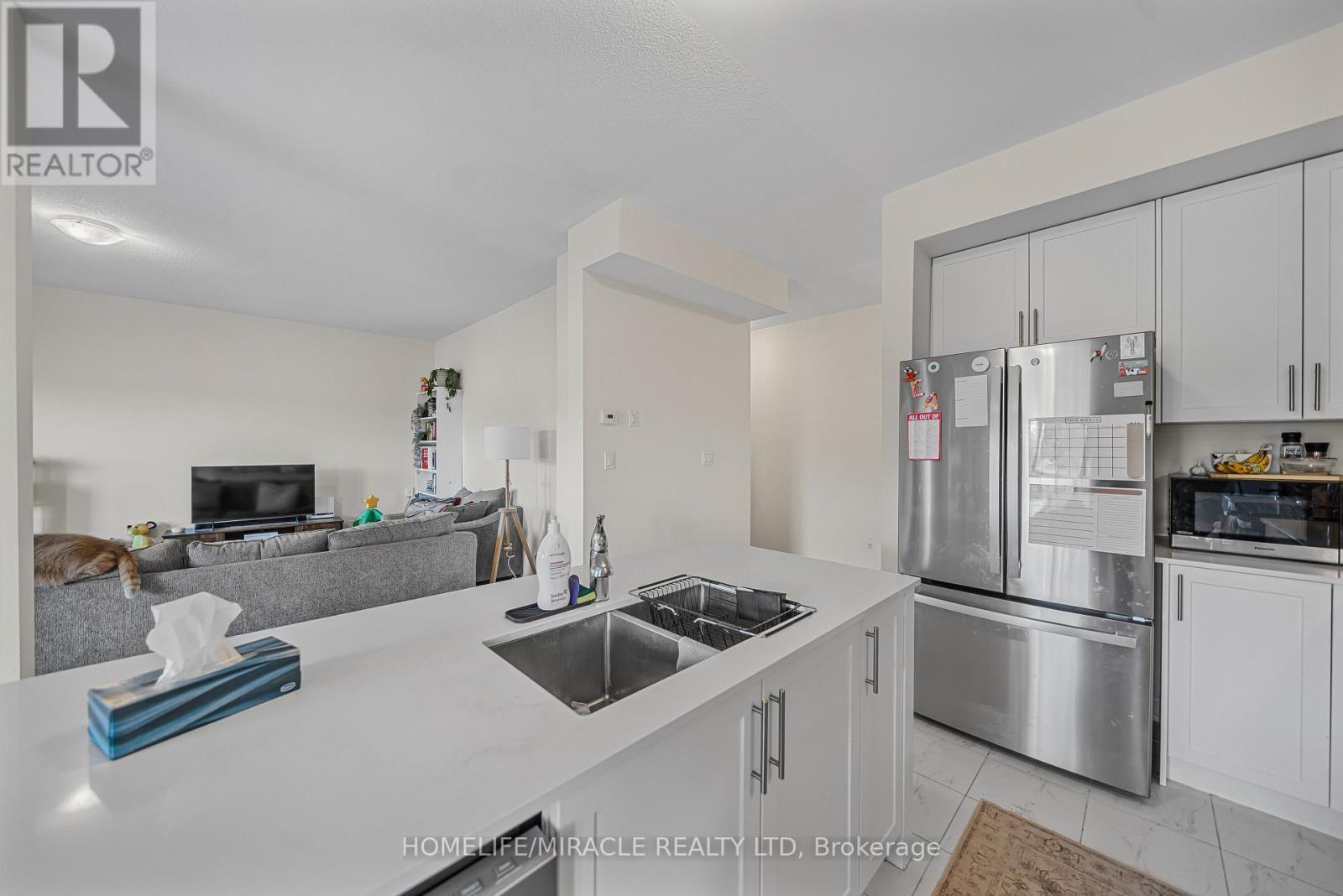 76 Oakmont Drive, Loyalist, ON - Indoor Photo Showing Kitchen With Double Sink With Upgraded Kitchen