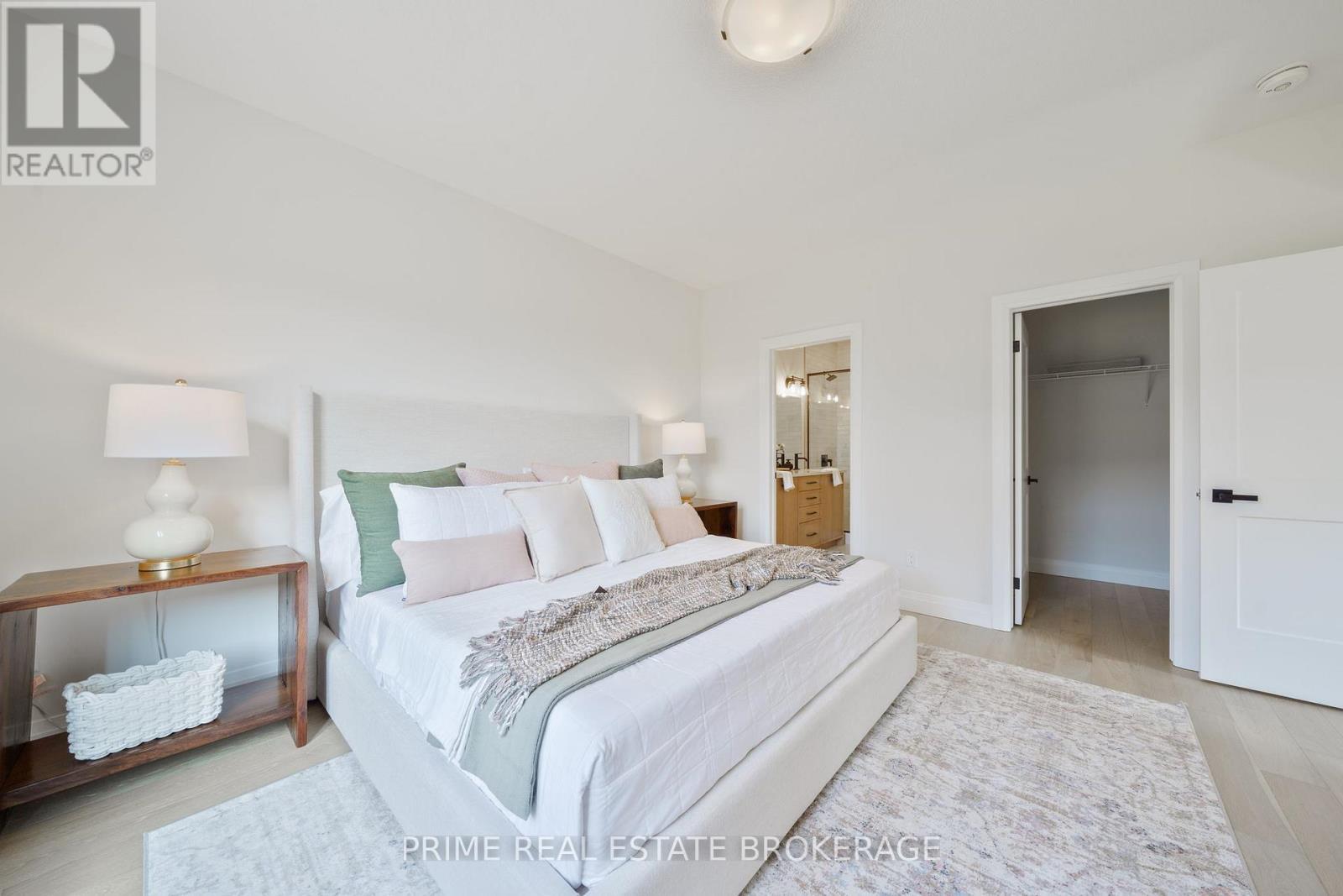 44 - 63 Compass Trail, Central Elgin, ON - Indoor Photo Showing Bedroom