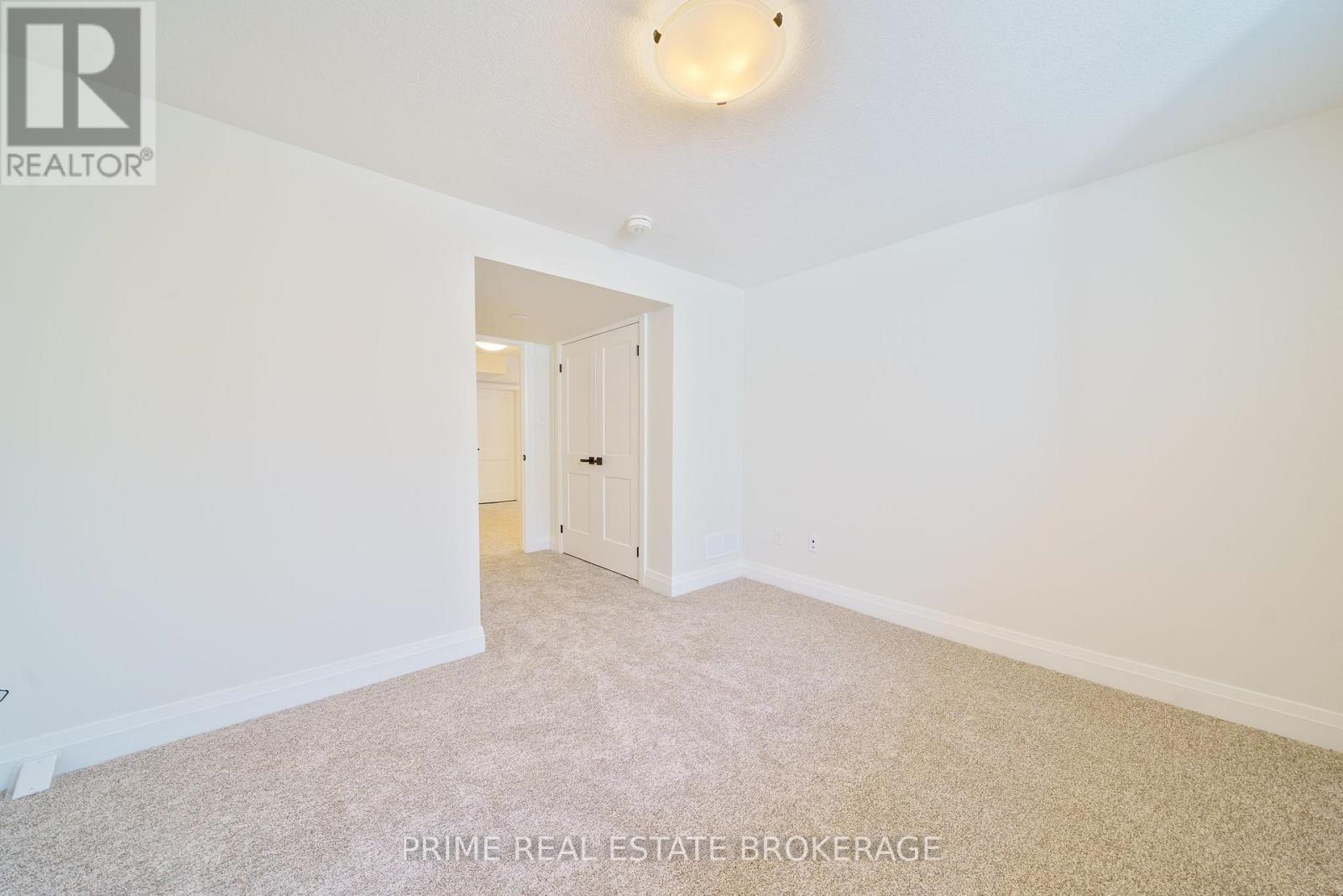 44 - 63 Compass Trail, Central Elgin, ON - Indoor Photo Showing Other Room