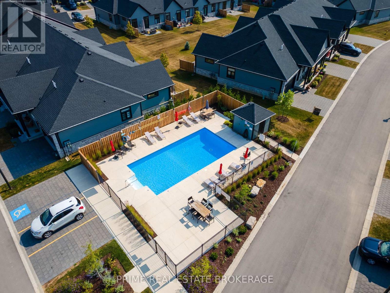 44 - 63 Compass Trail, Central Elgin, ON - Outdoor With In Ground Pool With View