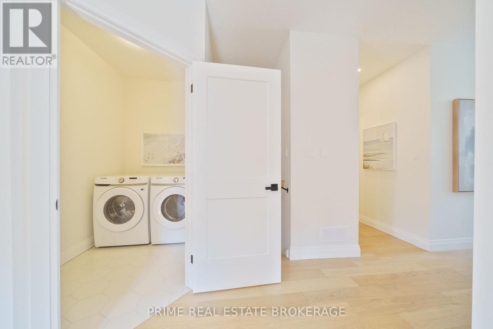 44 - 63 Compass Trail, Central Elgin, ON - Indoor Photo Showing Laundry Room