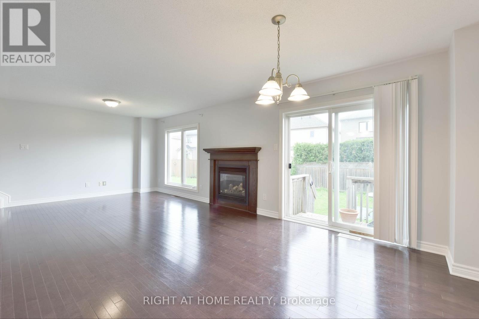 322 Brettonwood Ridge, Ottawa, ON - Indoor Photo Showing Other Room With Fireplace